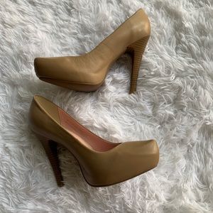 Beige leather pumps